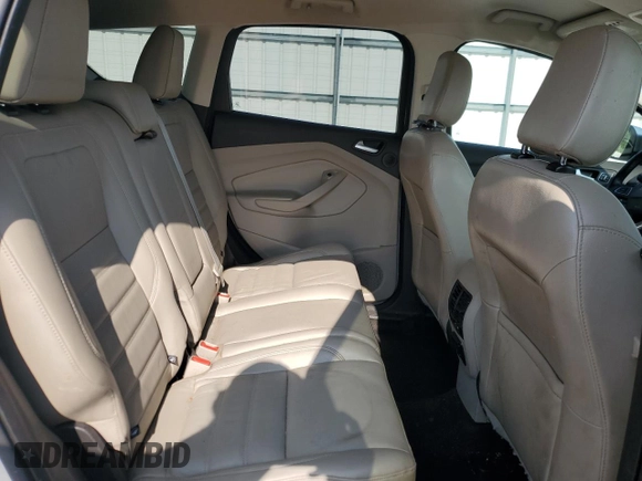 2018 Ford Escape Titanium z VIN 1FMCU0J95JUD44086, wystawiony jako Copart lot #58978865 z przebiegiem 90 874 mil mil oraz Szkoda całkowita • Salvage title. Historia ofert i sprzedaży dostępna na DreamBid. Obrazek 11.