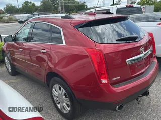 2015 Cadillac SRX Luxury Collection z VIN 3GYFNBE37FS569840, wystawiony jako Copart lot #52823025 z przebiegiem 183 816 mil mil oraz Czysty tytuł • Clean title. Historia ofert i sprzedaży dostępna na DreamBid. Obrazek 3.