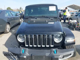 2023 Jeep Wrangler Sahara with VIN 1C4JJXP67PW556933, listed as a IAAI auction lot 41587035 with 20,463 mi miles and . Bid and sale history available at DreamBid. Image 12.