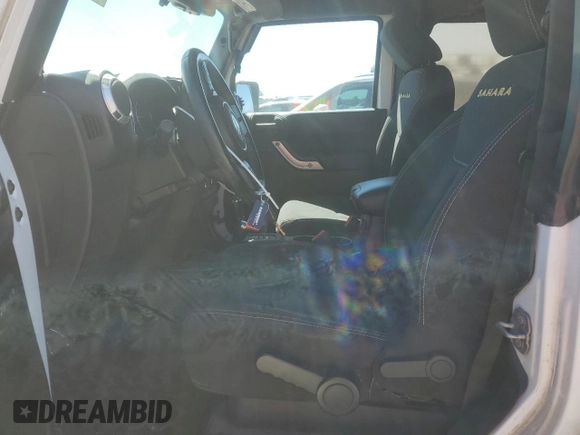 2014 Jeep Wrangler Sahara with VIN 1C4AJWBGXEL214269, listed as a Copart auction lot 47678045 with 283,634 mi miles and Clean Title. Bid and sale history available at DreamBid. Image 7.