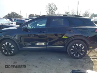 2023 Kia Sportage Plug-In Hybrid X-Line with VIN KNDPYDAH9P7027170, listed as a IAAI auction lot 41583963 with 15,276 mi miles. Bid and sale history available at carsss.com. Image 15.