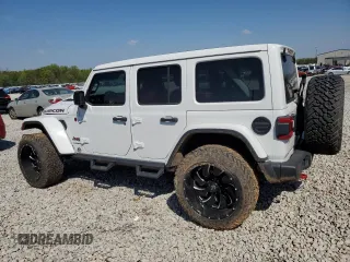 2021 Jeep Wrangler Unlimited Rubicon with VIN 1C4HJXFN3MW634045, listed as a Copart auction lot 52684805 with 34,133 mi miles and Clean Title. Bid and sale history available at DreamBid. Image 2.