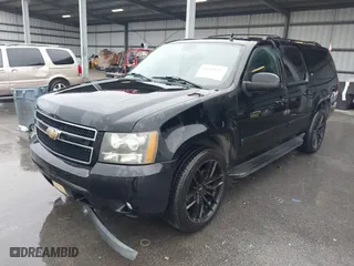 2007 Chevrolet Suburban LTZ with VIN 3GNFC16077G117408, listed as a IAAI auction lot 41834363 with 187,857 mi miles. Bid and sale history available at carsss.com. Image 2.