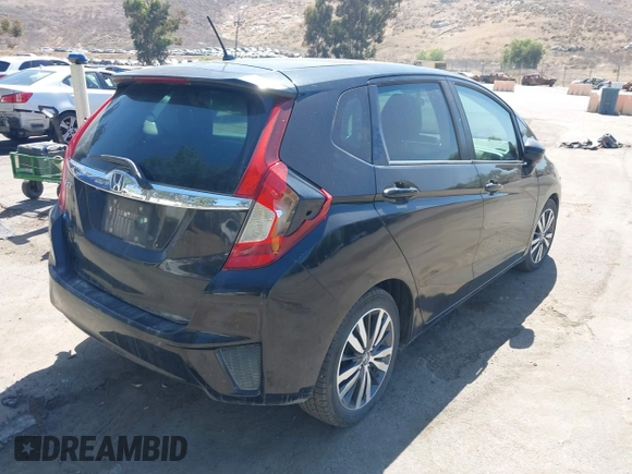 2015 Honda Fit EX-L z VIN 3HGGK5H88FM706513, wystawiony jako IAAI lot #42493772 z przebiegiem 173 129 mil mil oraz . Historia ofert i sprzedaży dostępna na DreamBid. Obrazek 4.