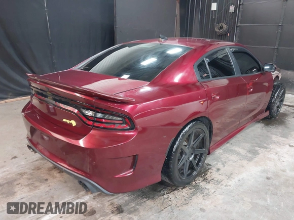 2019 Dodge Charger SRT Hellcat with VIN 2C3CDXL92KH693077, listed as a IAAI auction lot 39361432 with 57,522 mi miles and . Bid and sale history available at DreamBid. Image 4.
