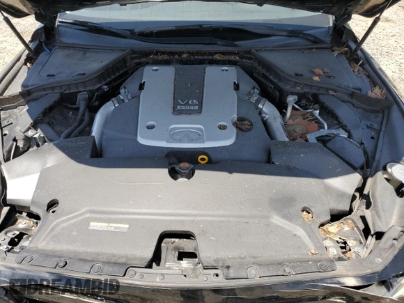 2015 Infiniti Q50 Premium z VIN JN1BV7AP7FM340202, wystawiony jako Copart lot #52777575 z przebiegiem 70 023 mil mil oraz Szkoda całkowita • Salvage title. Historia ofert i sprzedaży dostępna na DreamBid. Obrazek 11.
