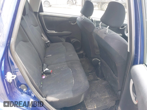 2011 Honda Fit Sport with VIN JHMGE8H57BC021538, listed as a IAAI auction lot 42263684 with 144,164 mi miles and . Bid and sale history available at DreamBid. Image 8.