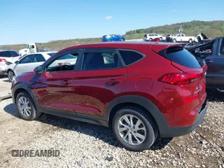 2019 Hyundai Tucson SE with VIN KM8J2CA41KU926156, listed as a IAAI auction lot 41888461 with 91,094 mi miles. Bid and sale history available at carsss.com. Image 14.