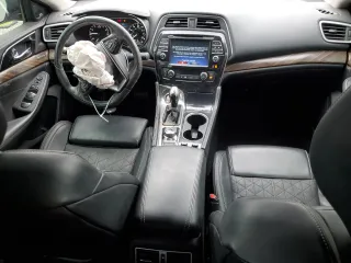 2018 Nissan Maxima Platinum z VIN 1N4AA6AP3JC371045, wystawiony jako Copart lot #43171805 z przebiegiem 62 223 mil mil oraz Szkoda całkowita • Salvage title. Historia ofert i sprzedaży dostępna na DreamBid. Obrazek 8.