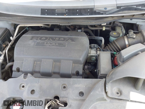 2012 Honda Odyssey EX-L with VIN 5FNRL5H61CB081634, listed as a IAAI auction lot 42760909 with 197,949 mi miles and . Bid and sale history available at DreamBid. Image 10.