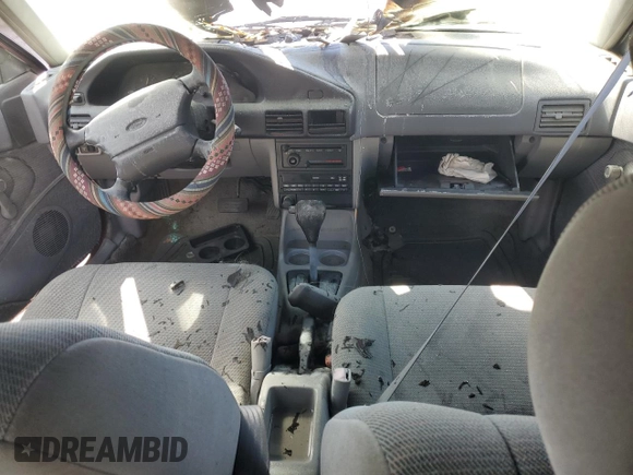1995 Ford Escort z VIN 1FASP15J1SW344941, wystawiony jako Copart lot #73689754 z przebiegiem Nie podano mil oraz Nie do naprawy. Historia ofert i sprzedaży dostępna na DreamBid. Obrazek 8.