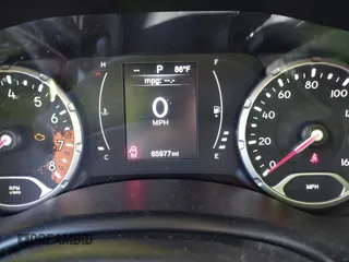 2015 Jeep Renegade Latitude with VIN ZACCJABT7FPC20455, listed as a IAAI auction lot 42250490 with 65,977 mi miles and . Bid and sale history available at DreamBid. Image 7.