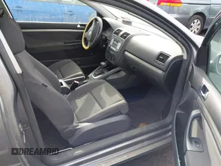 2009 Volkswagen Rabbit S with VIN WVWBB71K59W064153, listed as a IAAI auction lot 41514356 with 97,283 mi miles. Bid and sale history available at carsss.com. Image 5.