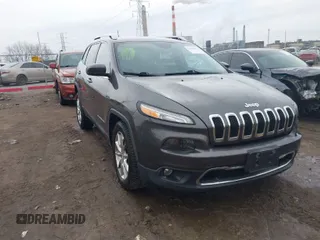 2014 Jeep Cherokee Limited with VIN 1C4PJMDS3EW137985, listed as a IAAI auction lot 41543651 with 131,312 mi miles. Bid and sale history available at carsss.com. Image 1.