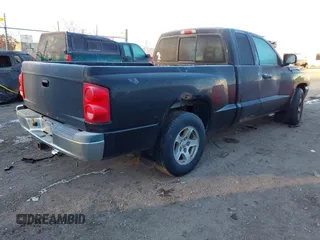 2005 Dodge Dakota SLT with VIN 1D7HW42N95S315558, listed as a IAAI auction lot 41210145 with 207,115 mi miles and . Bid and sale history available at DreamBid. Image 4.