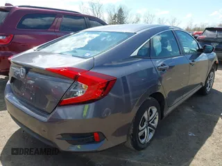 2018 Honda Civic LX with VIN 2HGFC2F5XJH586527, listed as a IAAI auction lot 42080372 with 52,114 mi miles and . Bid and sale history available at DreamBid. Image 4.