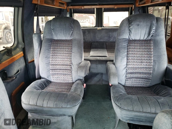 1997 Ford Econoline Commercial z VIN 1FDEE14L8VHB55692, wystawiony jako Copart lot #77627564 z przebiegiem 124 927 mil mil oraz Szkody całkowita. Historia ofert i sprzedaży dostępna na DreamBid. Obrazek 10.