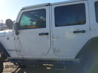 2016 Jeep Wrangler Unlimited Sahara with VIN 1C4BJWEG5GL243004, listed as a IAAI auction lot 40438321 with 121,360 mi miles and . Bid and sale history available at DreamBid. Image 14.