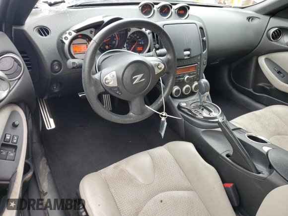2009 Nissan 370Z Touring with VIN JN1AZ44E69M404789, listed as a Copart auction lot 62015094 with 56,447 mi miles and Salvage Title. Bid and sale history available at carsss.com. Image 8.