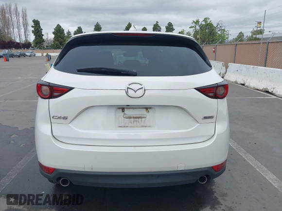 2018 Mazda CX-5 Grand Touring with VIN JM3KFADM1J0309995, listed as a IAAI auction lot 41977003 with 75,303 mi miles. Bid and sale history available at carsss.com. Image 17.