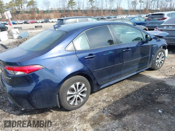 2021 Toyota Corolla Hybrid LE with VIN JTDEAMDE8MJ017192, listed as a IAAI auction lot 41669538 with 45,746 mi miles. Bid and sale history available at carsss.com. Image 4.