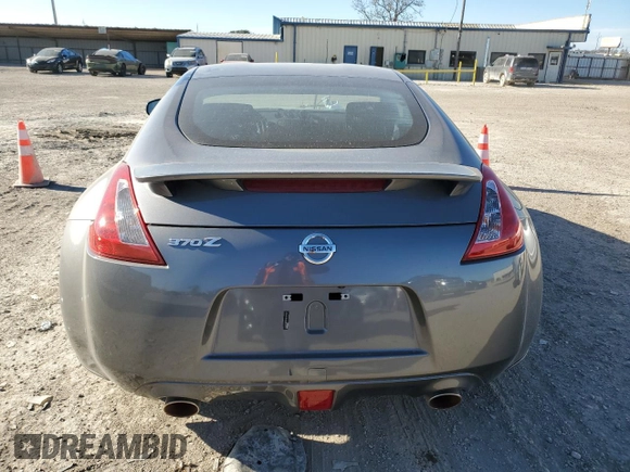 2014 Nissan 370Z Nismo with VIN JN1AZ4EH6EM633797, listed as a Copart auction lot 87879675 with 21,410 mi miles and Salvage Title. Bid and sale history available at DreamBid. Image 6.
