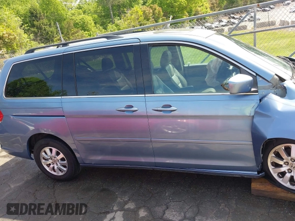 2008 Honda Odyssey EX-L with VIN 5FNRL38758B021134, listed as a IAAI auction lot 42097387 with 155,355 mi miles and . Bid and sale history available at DreamBid. Image 14.