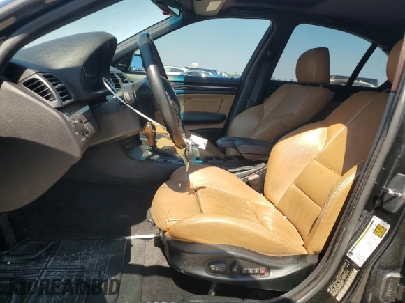 2005 BMW 3 Series 330i with VIN WBAEV53405KM43213, listed as a Copart auction lot 74597414 with 182,881 mi miles and Salvage Title. Bid and sale history available at carsss.com. Image 7.