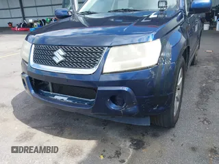 2010 Suzuki Grand Vitara Limited z VIN JS3TE1D9XA4100034, wystawiony jako IAAI lot #42466762 z przebiegiem 189 428 mil mil oraz . Historia ofert i sprzedaży dostępna na DreamBid. Obrazek 6.