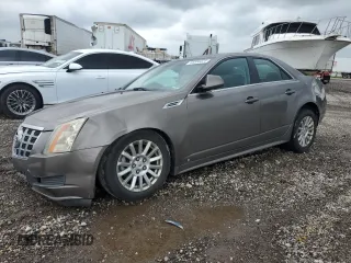 2012 Cadillac CTS z VIN 1G6DC5E58C0143151, wystawiony jako Copart lot #55886025 z przebiegiem 94 515 mil mil oraz Czysty tytuł • Clean title. Historia ofert i sprzedaży dostępna na DreamBid. Obrazek 1.