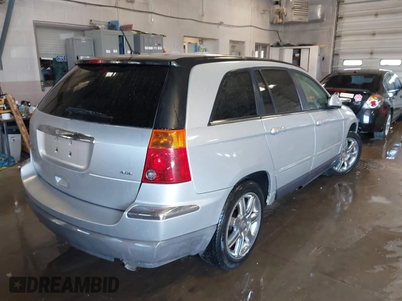 2007 Chrysler Pacifica Touring with VIN 2A8GM68XX7R140279, listed as a IAAI auction lot 41842527 with 135,721 mi miles. Bid and sale history available at carsss.com. Image 4.