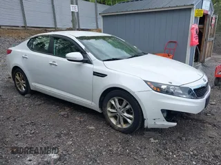 2013 Kia Optima EX z VIN 5XXGN4A75DG256318, wystawiony jako IAAI lot #42228217 z przebiegiem 88 291 mil mil oraz . Historia ofert i sprzedaży dostępna na DreamBid. Obrazek 1.