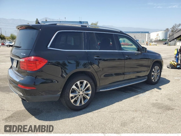 2015 Mercedes-Benz GL with VIN 4JGDF6EE4FA440695, listed as a Copart auction lot 58460214 with 130,161 mi miles and Salvage Title. Bid and sale history available at carsss.com. Image 3.