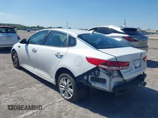 2018 Kia Optima LX with VIN 5XXGT4L33JG193537, listed as a IAAI auction lot 42033237 with 150,944 mi miles. Bid and sale history available at carsss.com. Image 3.