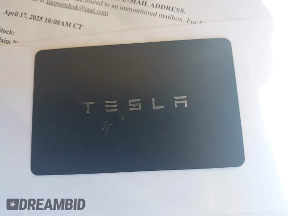 2021 Tesla Model 3 Long Range with VIN 5YJ3E1EB0MF902833, listed as a IAAI auction lot 41854474 with 41,982 mi miles and . Bid and sale history available at DreamBid. Image 11.