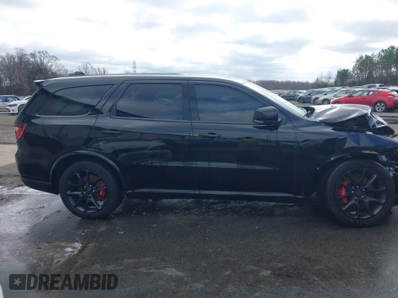 2023 Dodge Durango SRT Hellcat Premium with VIN 1C4SDJH90PC557375, listed as a IAAI auction lot 41328850 with 30,697 mi miles and . Bid and sale history available at DreamBid. Image 12.
