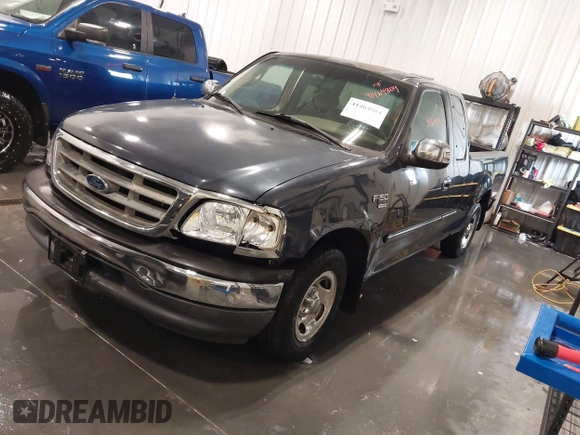 2001 Ford F-150 XL z VIN 1FTRX17L61NB44147, wystawiony jako IAAI lot #41464804 z przebiegiem 130 860 mil mil oraz . Historia ofert i sprzedaży dostępna na DreamBid. Obrazek 2.