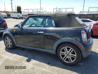 2015 MINI Convertible with VIN WMWZN3C56FT266838, listed as a Copart auction lot 50250745 with 60,331 mi miles and Salvage title. Bid and sale history available at DreamBid. Image 2.