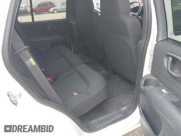 2004 Chevrolet Blazer LS z VIN 1GNDT13X34K157711, wystawiony jako IAAI lot #41282289 z przebiegiem 148 013 mil mil oraz . Historia ofert i sprzedaży dostępna na DreamBid. Obrazek 8.