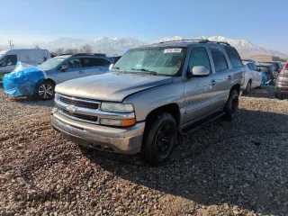 2000 Chevrolet Tahoe LT with VIN 1GNEK13T5YJ126234, listed as a Copart auction lot 42421965 with 215,442 mi miles and Salvage title. Bid and sale history available at DreamBid. Image 1.