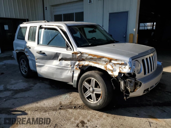 2010 Jeep Patriot Sport with VIN 1J4NF2GB4AD521492, listed as a Copart auction lot 48303095 with 0 mi miles and Salvage Title. Bid and sale history available at carsss.com. Image 4.