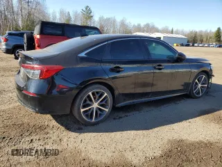 2022 Honda Civic Touring z VIN 2HGFE1F91NH001427, wystawiony jako Copart lot #53155195 z przebiegiem 83 921 mil mil oraz Szkoda całkowita • Salvage title. Historia ofert i sprzedaży dostępna na DreamBid. Obrazek 3.
