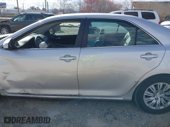 2014 Toyota Camry L with VIN 4T1BF1FK3EU301041, listed as a IAAI auction lot 41858386 with 136,998 mi miles and . Bid and sale history available at DreamBid. Image 15.