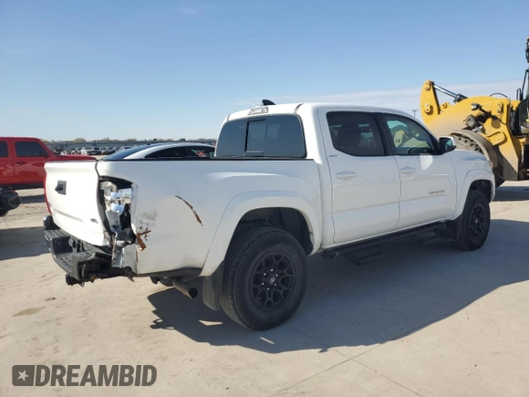 2022 Toyota Tacoma SR with VIN 3TMCZ5AN3NM506811, listed as a Copart auction lot 84630754 with 32,099 mi miles and Salvage title. Bid and sale history available at DreamBid. Image 3.