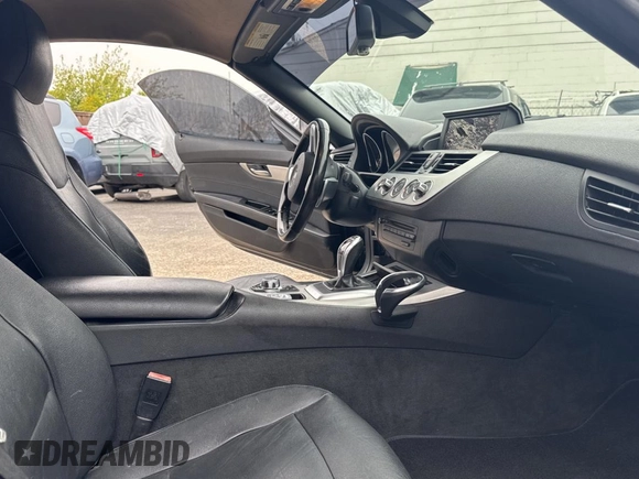 2013 BMW Z4 sDrive28i with VIN WBALL5C58DJ104449, listed as a Copart auction lot 79250174 with 119,451 mi miles and Clean Title. Bid and sale history available at carsss.com. Image 5.