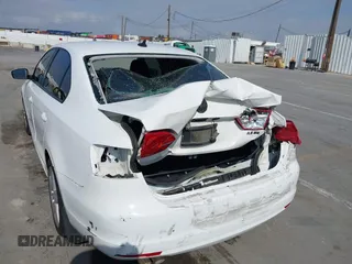 2012 Volkswagen Jetta SE z VIN 3VWDP7AJ4CM379192, wystawiony jako IAAI lot #42024746 z przebiegiem 125 450 mil mil oraz . Historia ofert i sprzedaży dostępna na DreamBid. Obrazek 6.