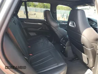 2016 BMW X5 M z VIN 5YMKT6C59G0R78590, wystawiony jako Copart lot #52993985 z przebiegiem Nie podano mil oraz Tytuł czysty. Historia ofert i sprzedaży dostępna na DreamBid. Obrazek 10.