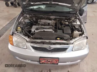 2000 Mazda Protege DX with VIN JM1BJ2226Y0206340, listed as a IAAI auction lot 41645396 with 238,500 mi miles and . Bid and sale history available at DreamBid. Image 10.