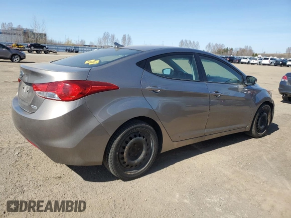 2013 Hyundai Elantra GLS z VIN 5NPDH4AE8DH425468, wystawiony jako Copart lot #54800815 z przebiegiem 320 397 mil mil oraz Czysty tytuł • Clean title. Historia ofert i sprzedaży dostępna na DreamBid. Obrazek 3.