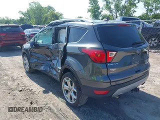2019 Ford Escape Titanium с VIN 1FMCU9J94KUC24611, выставлен на аукционе IAAI как лот 42595286 с пробегом 77 280 миль миль и . История ставок и продаж доступна на DreamBid. Изображение 3.